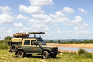 A jeep equipped with a roof rack, ready for safari trips in the Serengeti, highlighting the best time to visit Serengeti.